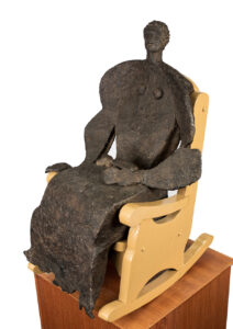 Elderly Lady with Pup bronze sculpture by Judith Peck